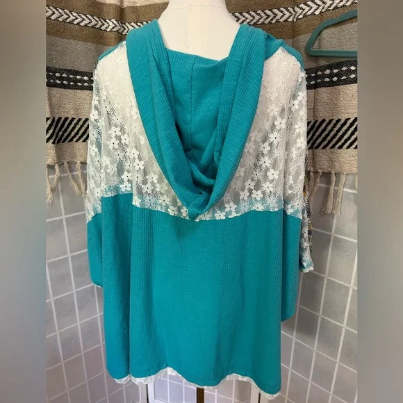 75. NWOT POL Turquoise Oversized V-neck Floral Peace Sign Hoodie - Picture 7 of 7